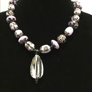 Purple bead necklace with large focal